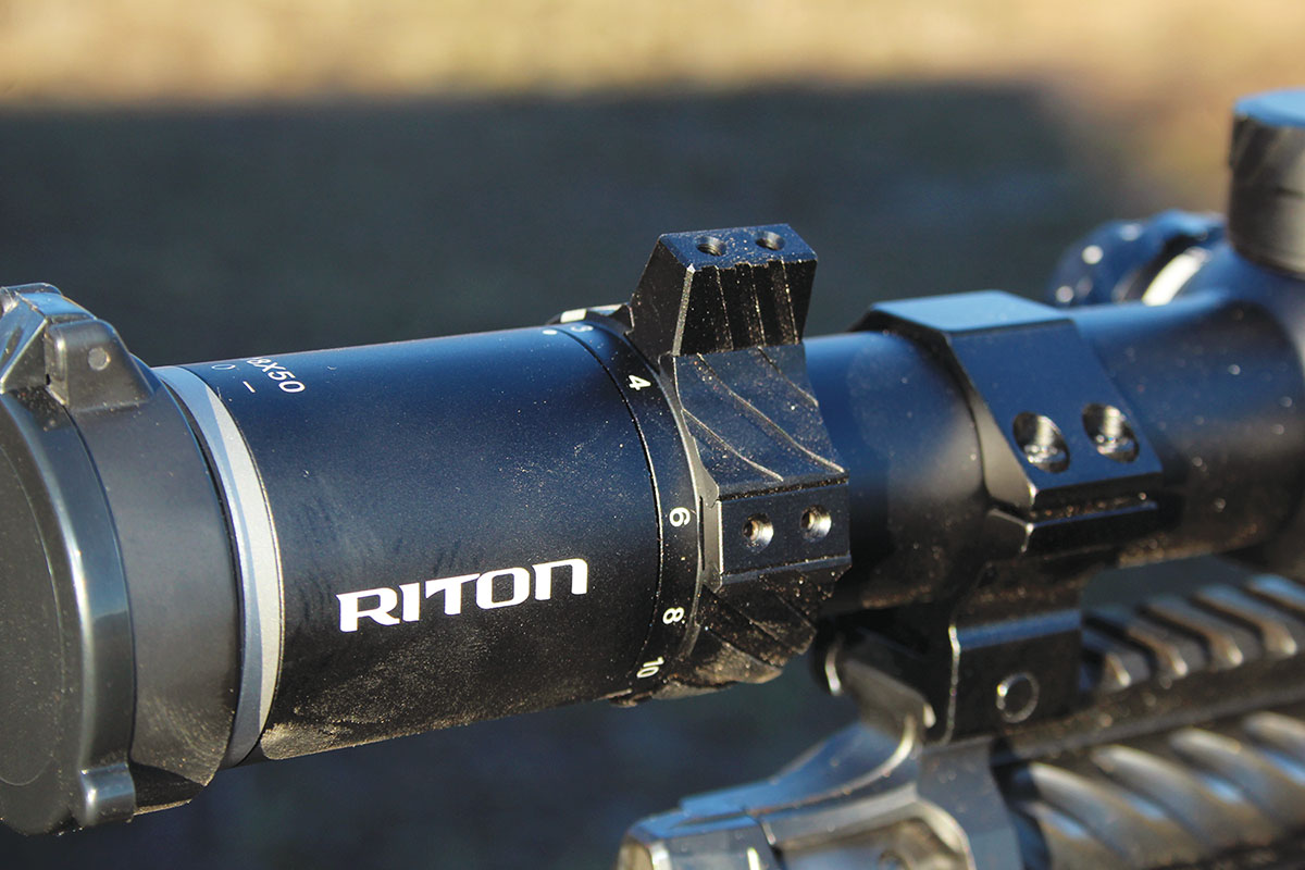 The magnification collar includes two throw-lever locations, as well as  options for lower profile or extended heights. It did not interfere with bolt  cycling at either location.